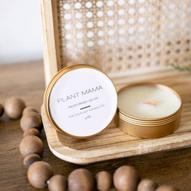 Coconut wax candle in 4 oz tin with wood wick