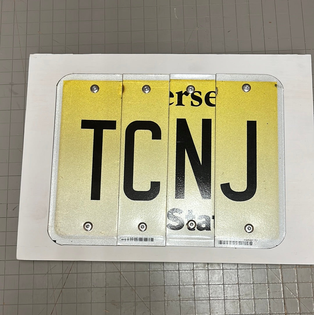 NJ College License Plate Sign on Wood