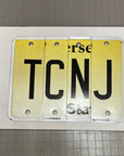 NJ College License Plate Sign on Wood